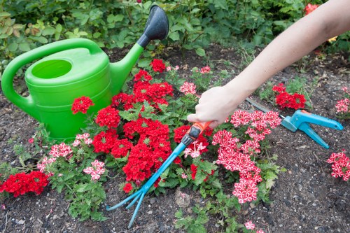 Team member wearing PPE during landscaping operations